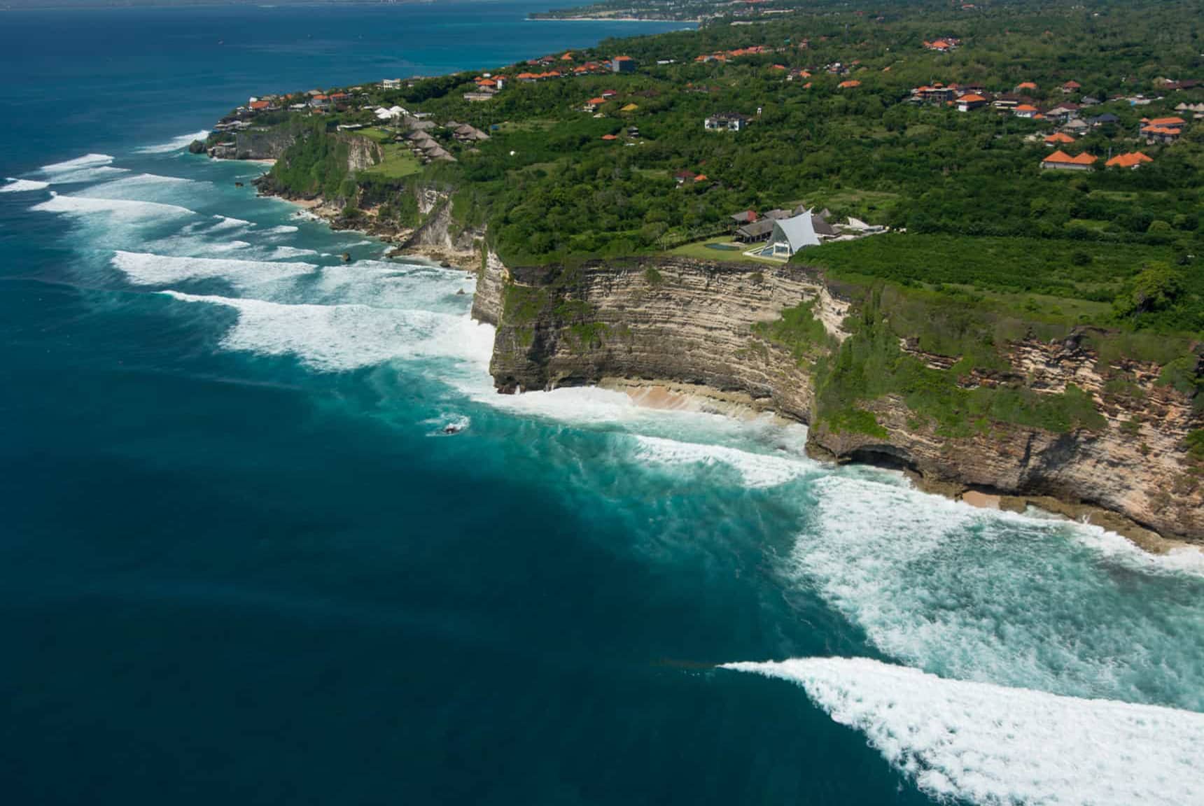 Hotel and villa properties, beaches, ocean, and Uluwatu Bali views