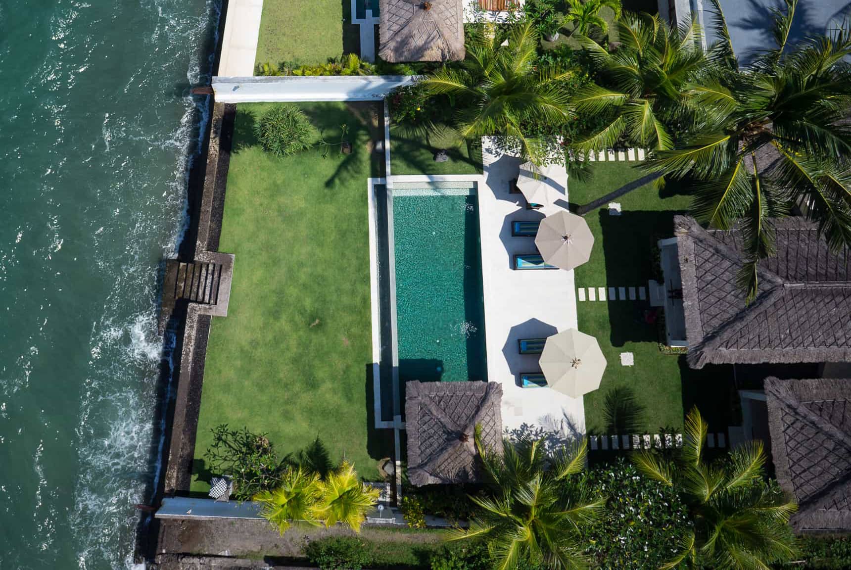 Pool, garden, villa layout, ocean, and Candidasa views