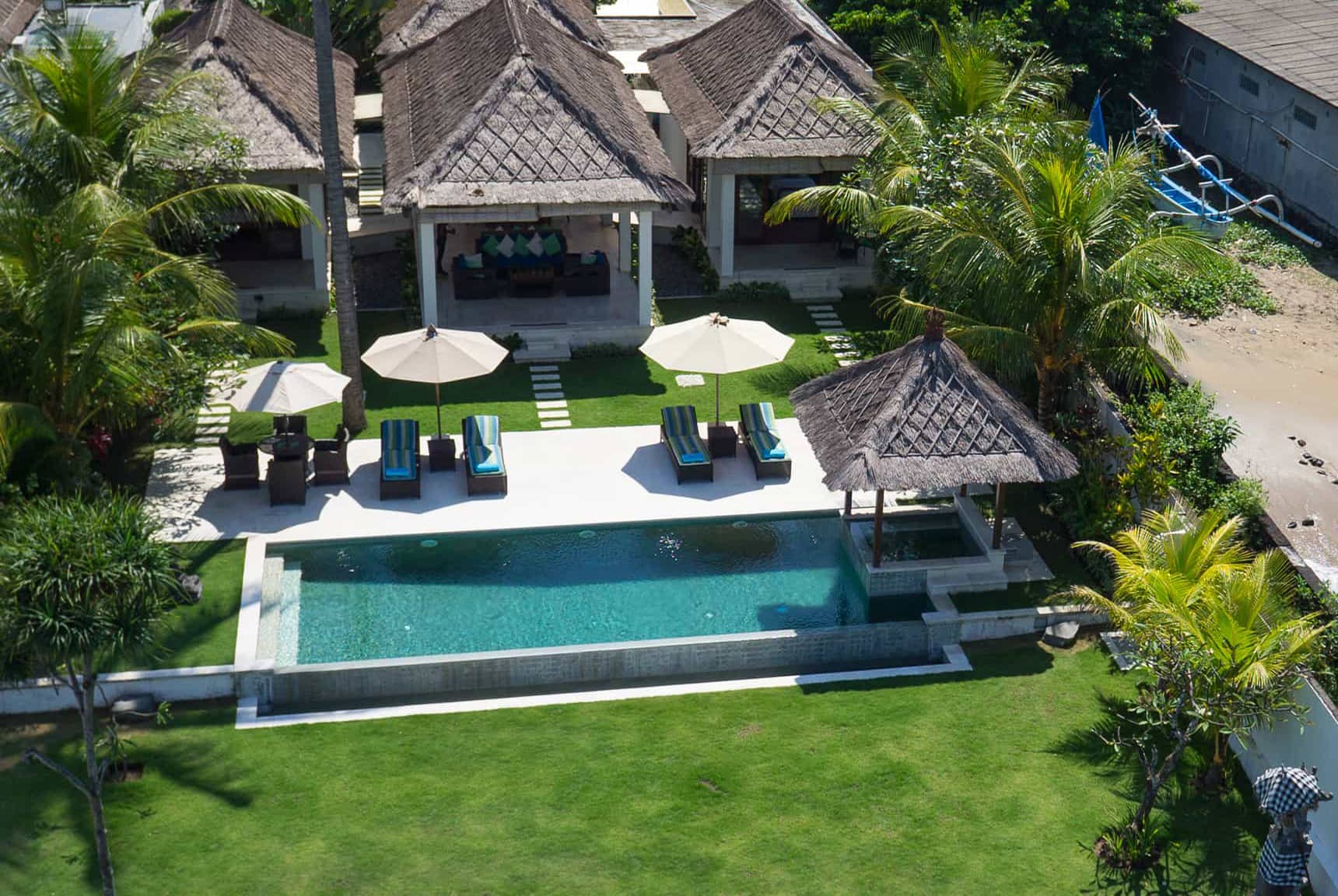 Pool, garden, villa layout, ocean, and Candidasa views