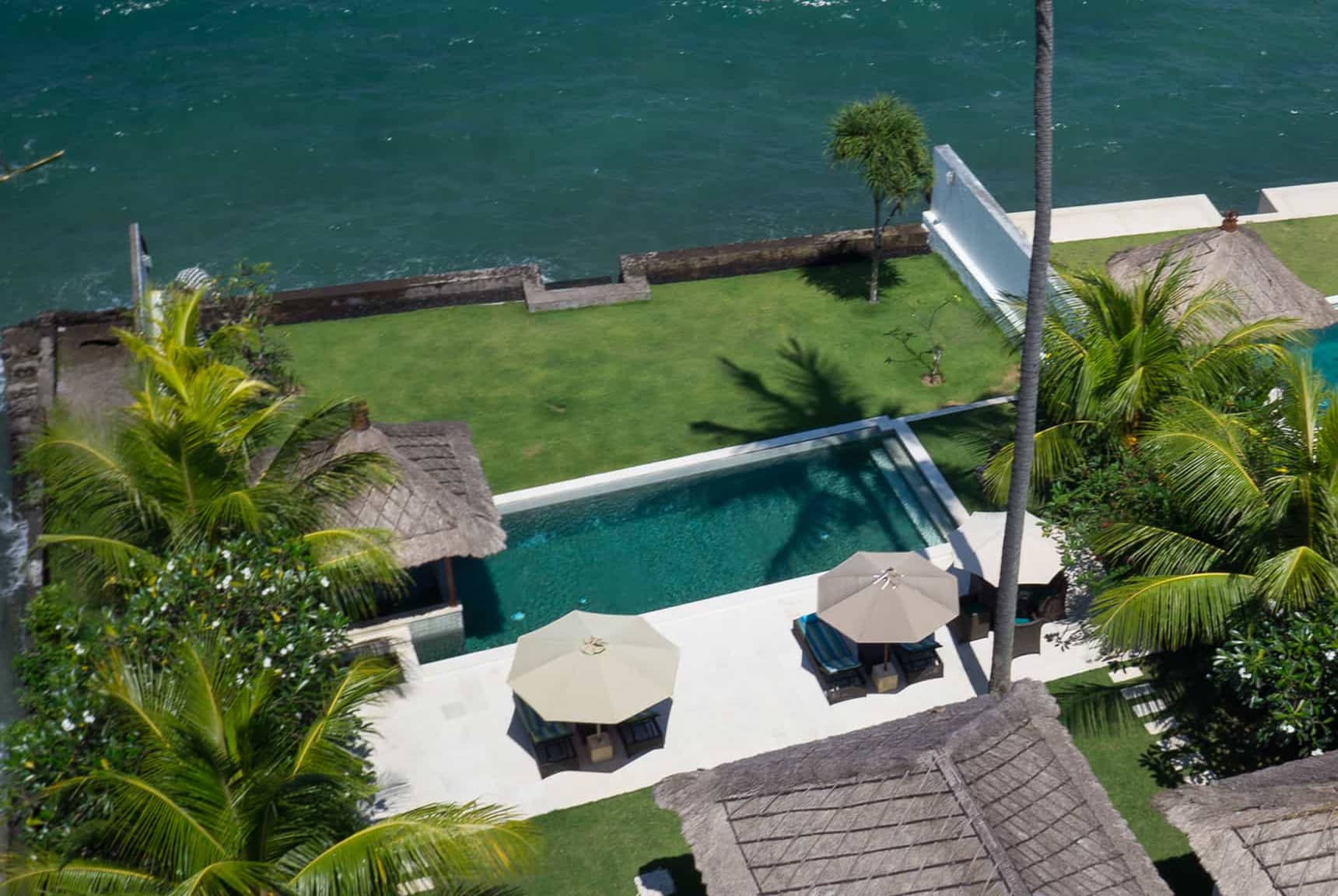 Pool, garden, villa layout, ocean, and Candidasa views